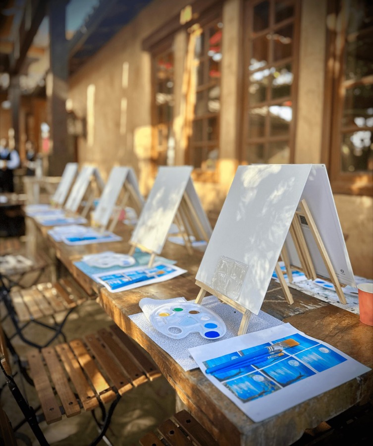 Canvases and palettes prepared for a mobile event